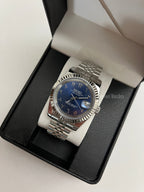Datejust (Arabic Royal Blue) Seiko NH35 automatic mod watch. A blue dial watch with a silver fluted bezel and jubilee bracelet inside an open watch box.