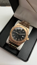 Royal Oak (Rose Gold) Seiko NH35 automatic mod watch. A slightly angled view shows the rose gold watch with a black dial inside an open black display box.
