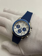 Speedmaster (Blue) Seiko VK63 meca-quartz chronograph mod watch. A full watch shot showing a white dial with blue sub dials and a blue bezel on a blue rubber strap.