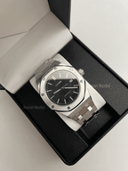 Royal Oak (Black) Seiko NH35 automatic mod watch. A black dial watch with a silver bezel and metal link bracelet inside an open watch box.
