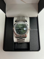 Datejust (Arabic Olive) Seiko NH35 automatic mod watch. A full watch with a green dial and silver fluted bezel on a silver jubilee bracelet inside a box.