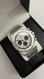 Royal Oak Chrono (Panda) Seiko VK63 meca-quartz chronograph mod watch. A high angle shot of a watch with a white dial and black subdials inside a black display box.