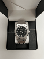 Royal Oak (Black) Seiko NH35 automatic mod watch. A black dial watch with a silver bezel and metal link bracelet inside an open watch box.