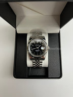 Datejust (Arabic Black) Seiko NH35 automatic mod watch. A black dial watch with a silver fluted bezel and a metal jubilee bracelet inside an open gift box.