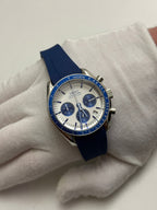 Speedmaster (Blue) Seiko VK63 meca-quartz chronograph mod watch. A full watch shot showing a white dial with blue sub dials and a blue bezel on a blue rubber strap.