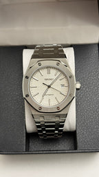 Royal Oak (White) Seiko NH35 automatic mod watch. A silver dial watch with a silver bezel and integrated metal bracelet shown in a full front view.