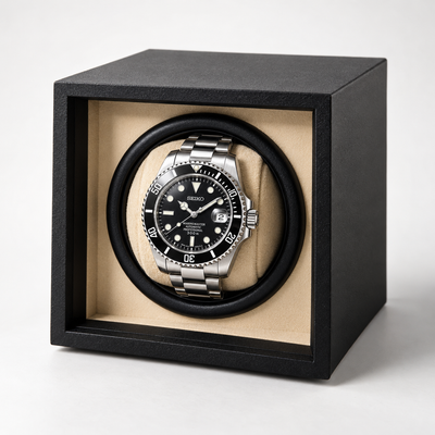 Steel Submariner watch on the automatic watch winder