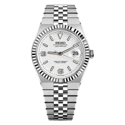 Land-Dweller Japanese automatic mod watch. A full watch shot showing a white honeycomb textured dial with a silver fluted bezel and a steel flat link bracelet.