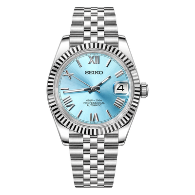Datejust (Blue Roman) Seiko NH35 automatic mod watch. A light blue dial watch with a silver fluted bezel and a silver metal jubilee bracelet shown in a full product shot.