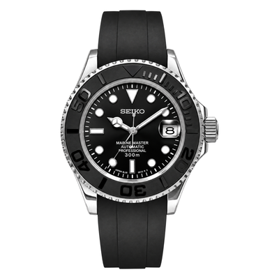 Yacht-Master (Grey) mod watch. A full watch with a black dial and bezel on a black rubber strap inside a watch box.