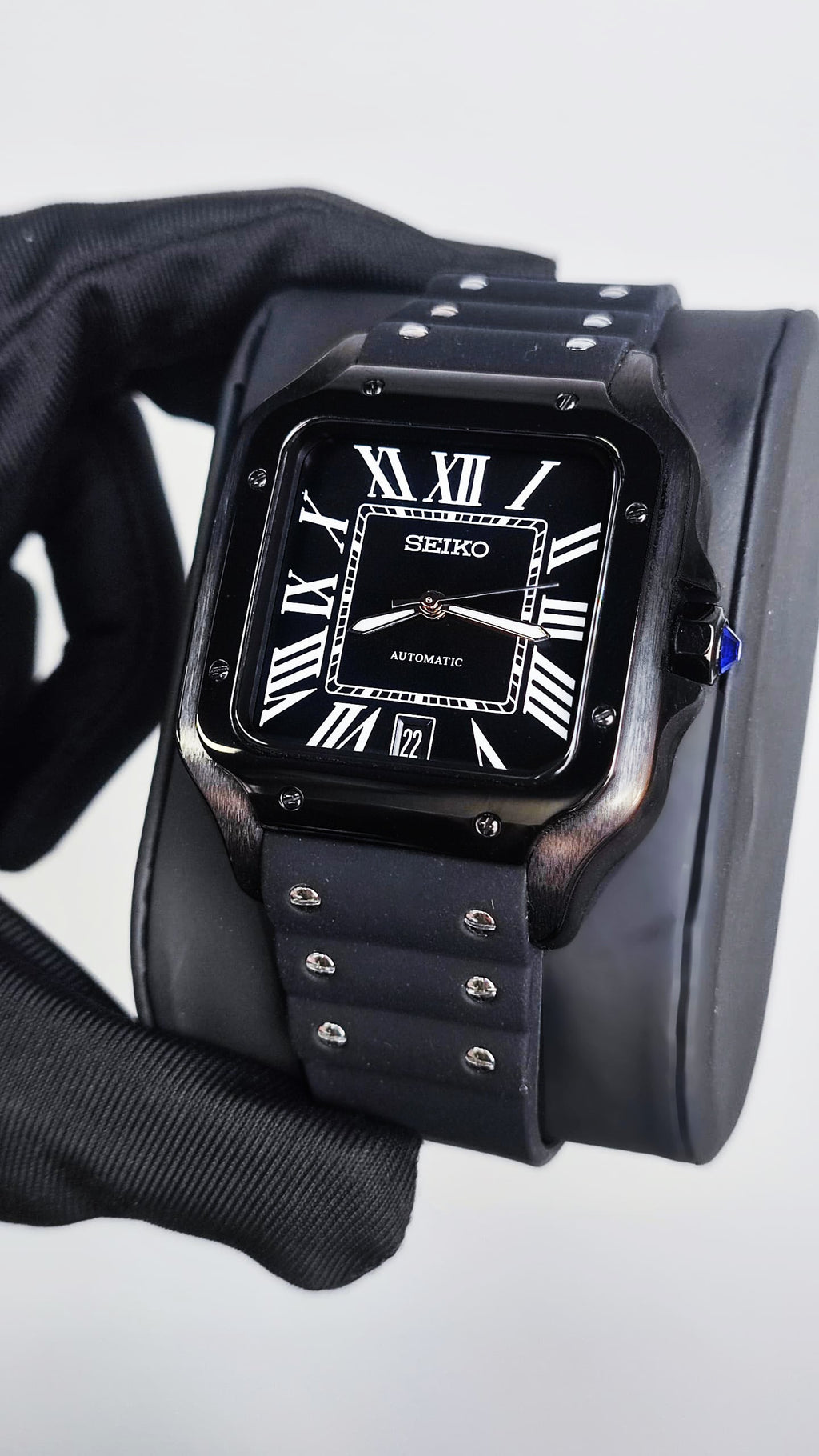 Santos (Black) Seiko NH35 automatic mod watch. A full watch shot showing a black dial with white Roman numerals and a black rubber strap.