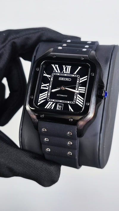Santos (Black) Seiko NH35 automatic mod watch. A full watch shot showing a black dial with white Roman numerals and a black rubber strap.